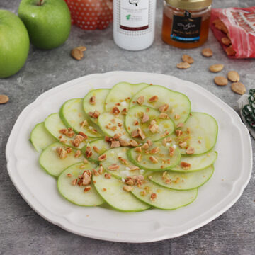 Imagen de la receta Carpaccio de Manzana con Aove, Miel, Almendras y Sal: Un plato gourmet en 5 minutos