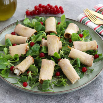 Imagen de la receta Rollitos de lomo de orza y crema de queso con pistachos